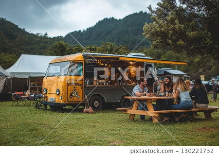 Food truck gathering scenic park outdoor event relaxed atmosphere group dining community vibe 130221732