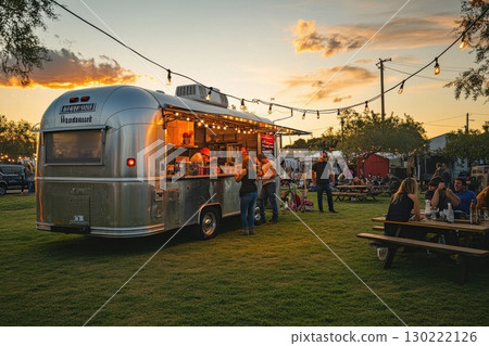 Food truck experience at sunset outdoor festival event photography vibrant atmosphere community gathering 130222126