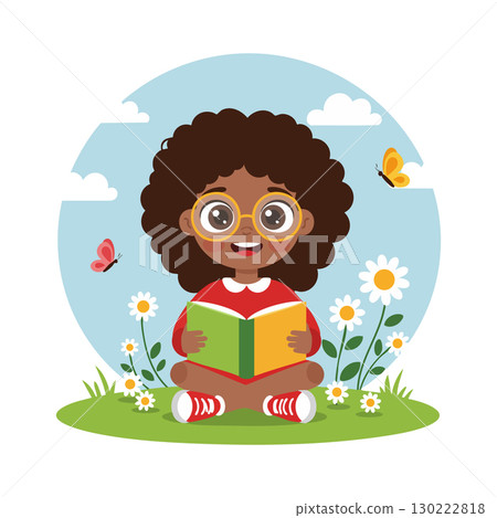 Girl with curly hair reading book outdoors with butterflies and flowers in summer 130222818