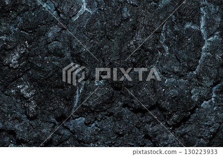 Dark and wild gunmetal-toned rock surface background texture (illustration-style retouched and color-processed image) 130223933