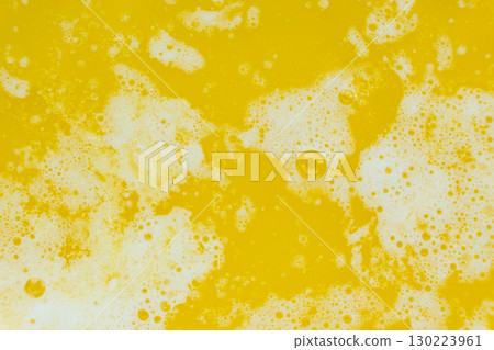 The process of making ghee from butter, macro texture. The process of making ghee from butter, macro texture. 130223961
