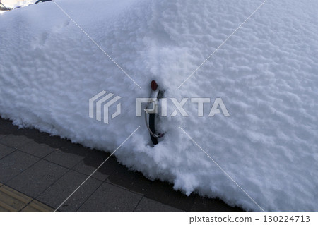 Bicycle buried in snow 130224713
