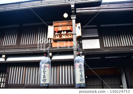 Old townscape of Takayama City, Gifu Prefecture, Japan. Historical old houses and decorative lanterns. An altar enshrined during the Takayama Spring Festival. Old townscape of Takayama City, Gifu Prefecture, Japan. Historical old houses and decorative lanterns. An altar enshrined during the Takayama Spring Festival. 130224753