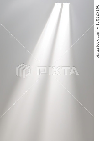 White wall receiving soft light beams, creating gentle gradient and minimalist ambiance. Serene illumination highlighting clean, elegant architectural design 130225166