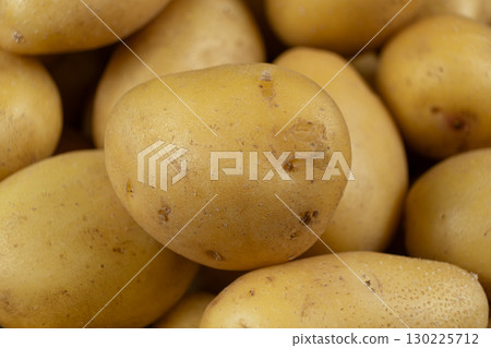 Fresh Raw Unpeeled Potatoes Close-Up, Natural Farm Vegetables. Fresh Raw Unpeeled Potatoes Close-Up, Natural Farm Vegetables. 130225712