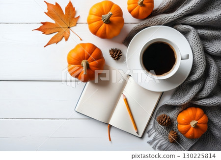 Cup of coffee with pumpkins and autumn leaves 130225814