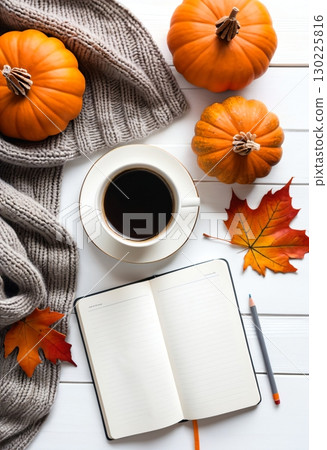 Cozy autumn composition with pumpkins coffee and scarf 130225816