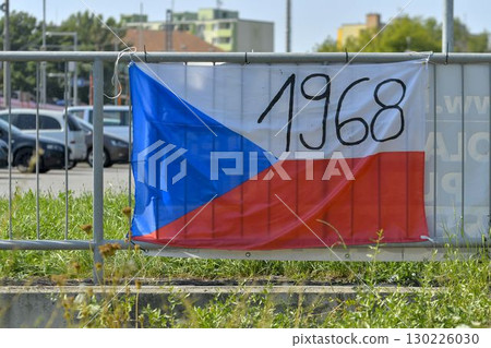 View of the Czech flag displayed on the railing. The flag shows the year 1968. On 20 21 August 1968, the Czechoslovak Socialist Republic was jointly invaded by four Warsaw Pact countries: the Soviet 130226030