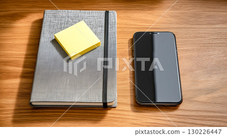 Wooden desk workspace: A simple and calm interior with a notebook and smartphone Wooden desk workspace: A simple and calm interior with a notebook and smartphone 130226447