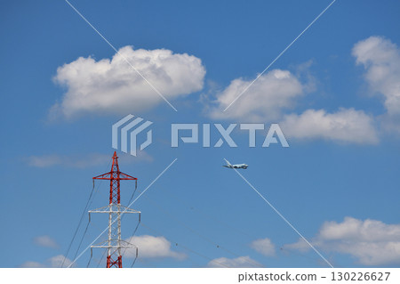 A cute white cloud floating in the blue sky A cute white cloud floating in the blue sky 130226627