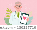 Doctor holding clipboard with heart shape promoting healthcare and love 130227710