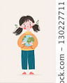 Young girl embracing planet earth promoting environmental awareness 130227711