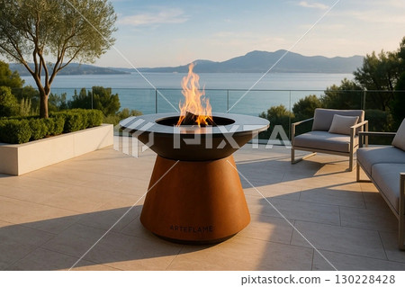 Luxury Arteflame Grill in Modern Outdoor Setting with Water View 130228428