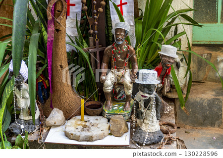 Altar among plants with deities and objects 130228596