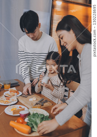 Family spends their free time together 130228695