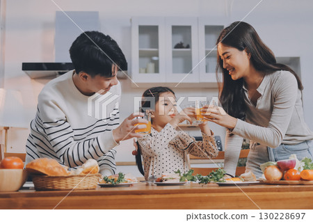Family spends their free time together Family spends their free time together 130228697