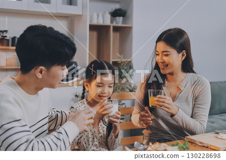 Family spends their free time together 130228698