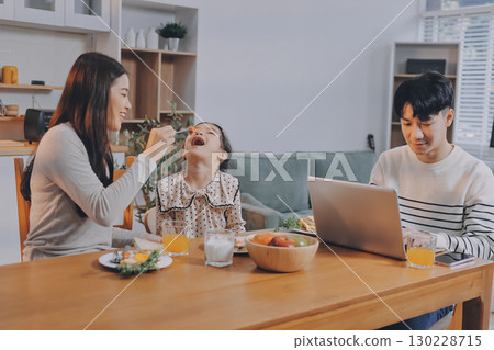 Family spends their free time together Family spends their free time together 130228715