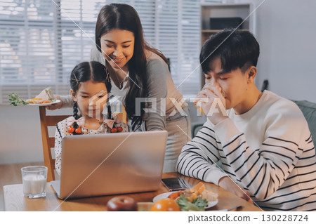 Family spends their free time together 130228724