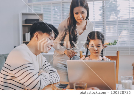 Family spends their free time together 130228725