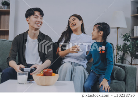 Family spends their free time together 130228750