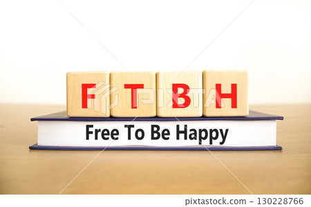 FTBH Free To Be Happy symbol. Concept word FTBH Free To Be Happy on beautiful wooden blocks and book. Beautiful white background. Business motivational FTBH Free To Be Happy concept. Copy space. FTBH Free To Be Happy symbol. Concept word FTBH Free To Be Happy on beautiful wooden blocks and book. Beautiful white background. Business motivational FTBH Free To Be Happy concept. Copy space. 130228766