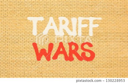 Trade tariff wars symbol. Concept word Tariff wars on beautiful brown brick wall. Beautiful brown brick wall background. Brick wall. Business trade tariff wars concept. Copy space. 130228953