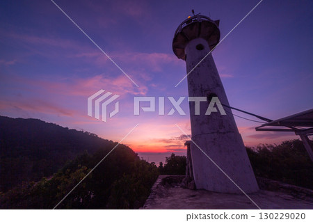 Lighthouse at Sunset 130229020