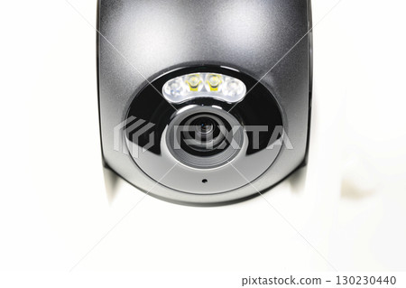 close-up shot lens of home security camera on white background. close-up shot lens of home security camera on white background. 130230440