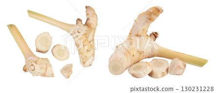 Fresh galangal root with slices isolated on white background with full depth of field. Top view. Flat lay Fresh galangal root with slices isolated on white background with full depth of field. Top view. Flat lay 130231228