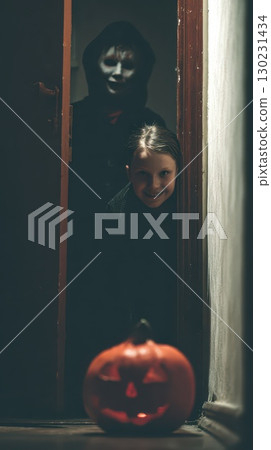Halloween trick or treating fun at the door 130231434