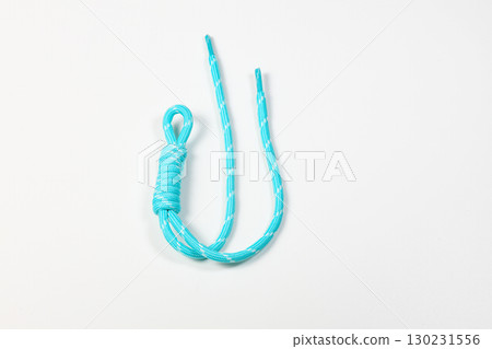 close up of color nylon shoelace isolated on white background. 130231556