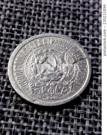 Silver Kopeck Coin From RSFSR Featuring Emblematic Design and Year on Obverse Side Silver Kopeck Coin From RSFSR Featuring Emblematic Design and Year on Obverse Side 130231894
