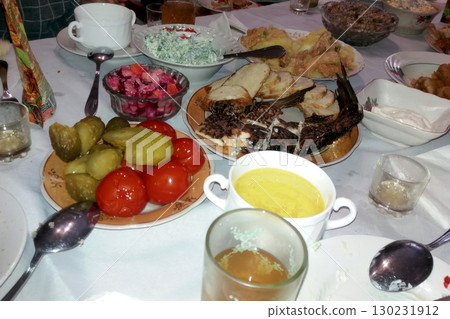 Festive Table Filled With Traditional Dishes During a Cultural Celebration Festive Table Filled With Traditional Dishes During a Cultural Celebration 130231912