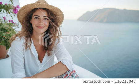 Smiling woman in a coastal setting 130233045