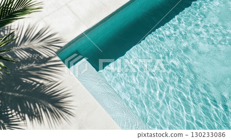 Clear water glistens in modern pool Clear water glistens in modern pool 130233086