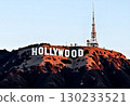 Hollywood sign bathed in the setting sun [AI-generated image] 130233521