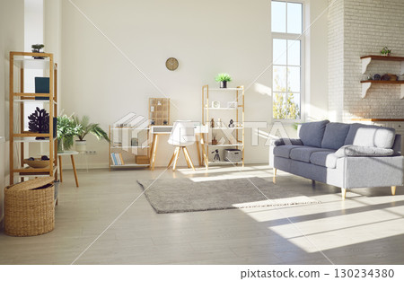 Design of a cozy modern living room interior in a new clean light sunny apartment 130234380
