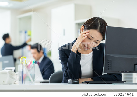 Middle business woman working in the office 130234641