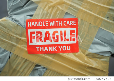 Deliveries require care when handling fragile items 130237592