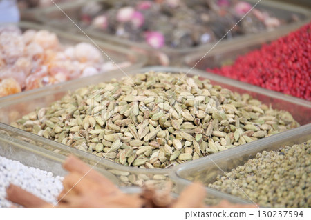 Colorful spices in market stalls showcase variety 130237594