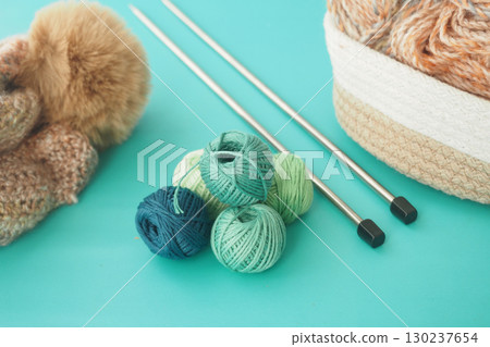 Knitting supplies on a bright background Knitting supplies on a bright background 130237654