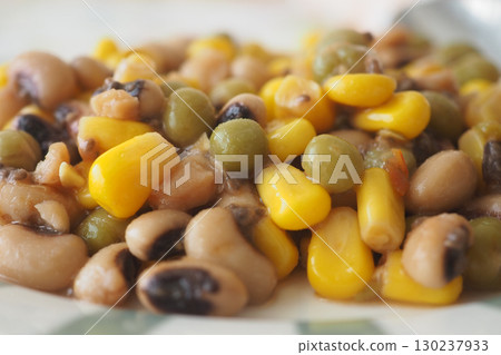 Colorful dish of beans and corn served on a plate Colorful dish of beans and corn served on a plate 130237933