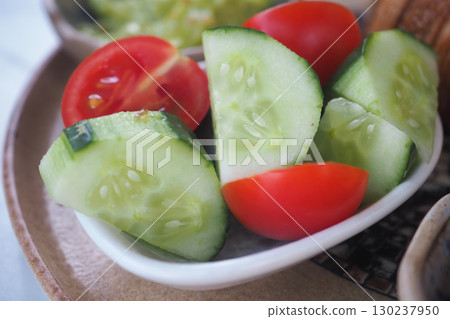 Fresh vegetables served in a bowl during a meal Fresh vegetables served in a bowl during a meal 130237950