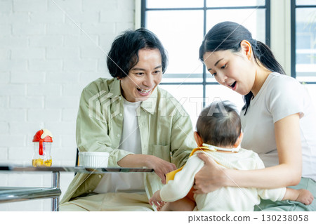 Baby eating baby food 130238058