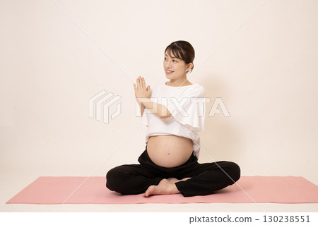 A woman doing maternity yoga 130238551