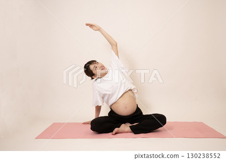 A woman doing maternity yoga 130238552
