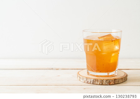 Delicious sweet drink tamarind juice and ice cube Delicious sweet drink tamarind juice and ice cube 130238793