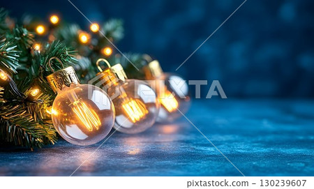Festive Edison Bulb Ornaments on Christmas Tree Branch Festive Edison Bulb Ornaments on Christmas Tree Branch 130239607
