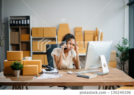 eelance woman working at home office, BOX,tablet and laptop online, marketing, packaging, delivery,  e-commerce concept 130240106